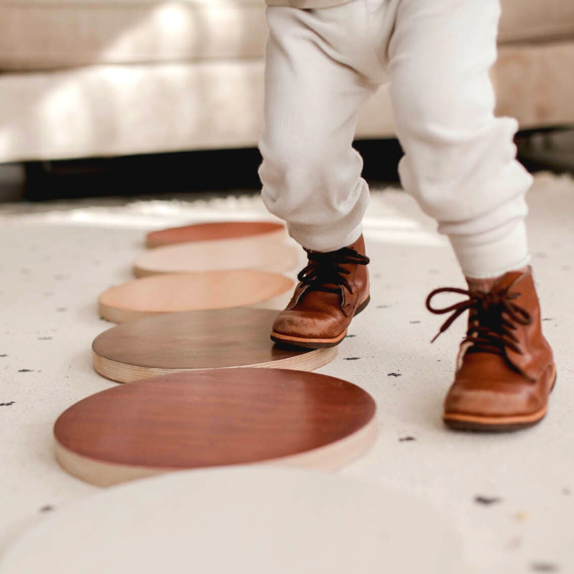 Kids using outdoor stepping stones