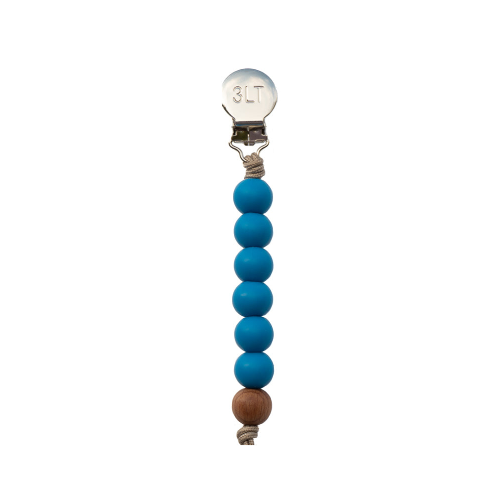 Three Little Tots Ocean Blue Silicone beaded pacifier clip. This paci clip is handmade in the USA.